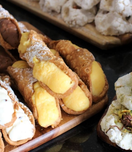 Cannoli and pastries on a plate at A Mano Cafe, Annerley