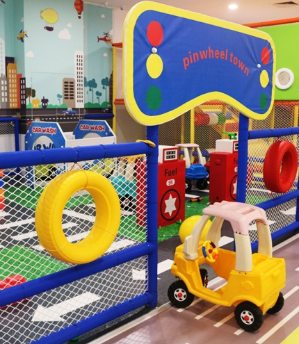 Play equipment inside Pinwheels Cafe