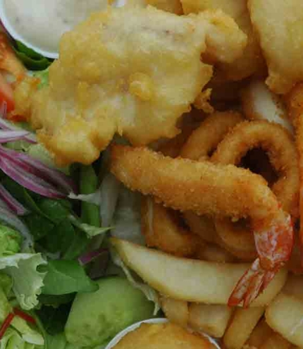 Plate of fish and chips inside Samson Fish Seafood Cleveland