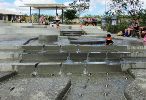 Darlington Parklands Yarrabilba - children playing with water jets 