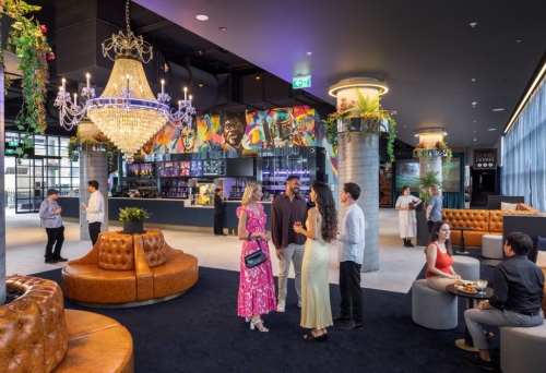 People standing inside the foyer of Angelika Cinemas 