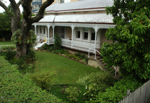 Bertholmehouse and front yard in New Farm