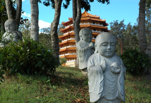 Statues in garden park in front of temple in Chung Tian Temple in Priestdale