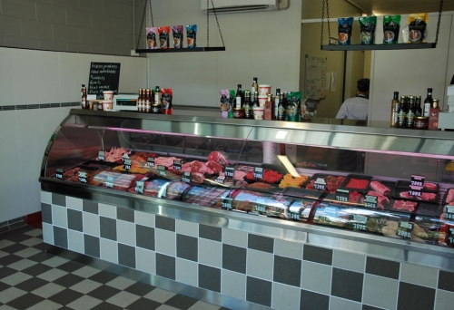 Meat counter inside Gordon &amp; Luxton in Graceville.