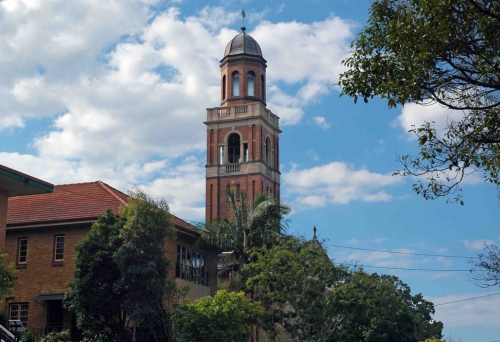 Holy Spirit Catholic Church tower and trees in New farm