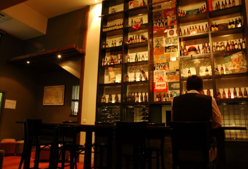 Man sitting on a stoll at bar inside Platform Bar in Brisbane's cbd