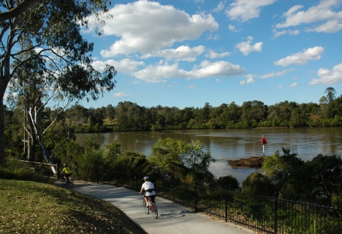 Cyclist on Rocks Riverside bikeway