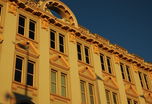 TCB Building facade at sunset.