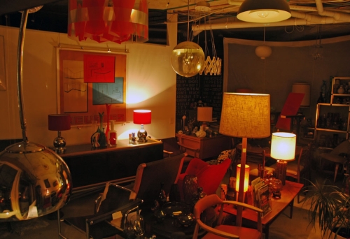 Vintage and designer lamps and furniture inside The Vinyl Frontier shop.