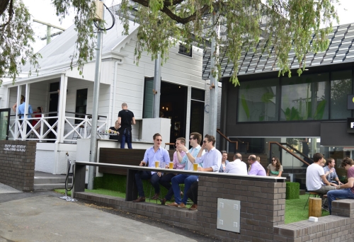 People drinking outside At Sixes and Sevens Bar in Brisbane's Fortitude Valley