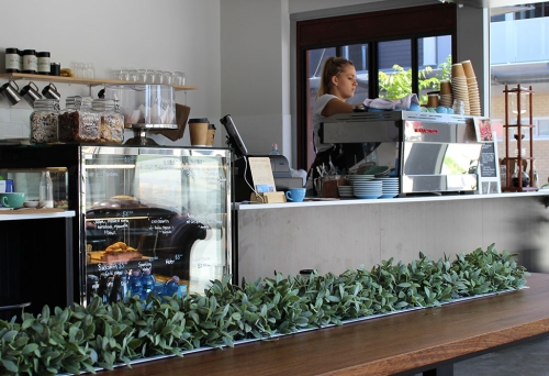 Staff at counter at Blacksmith Specialty Coffee Mt Gravatt