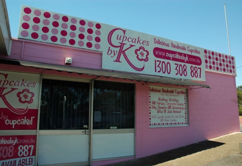 Pink painted shop front of Cupcakes by K in Chermside West