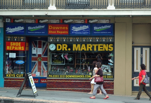 Pedestians walking in front of Downes Shoes shop on Ann St Fortitude Valley
