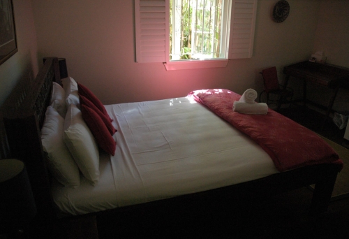 Double bed inside Edward Lodge in Brisbane's New Farm