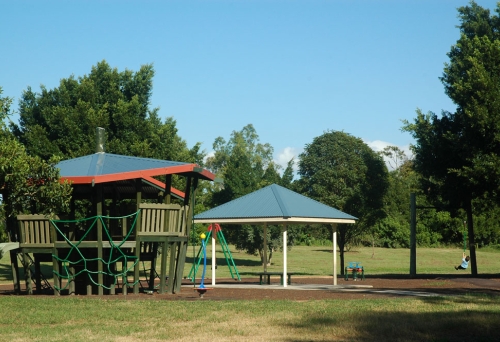 Playground equipment and fort inside Faulkner Park Graceville