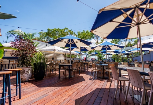 Beer garden deck with umbrellas Mango Hill Tavern