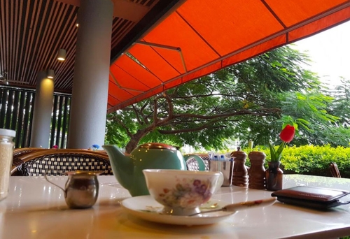 Cup of coffee on table at Bliss on Riverside