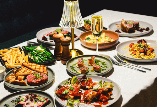 Food on plates at Hepburn's Steakhouse Wynnum
