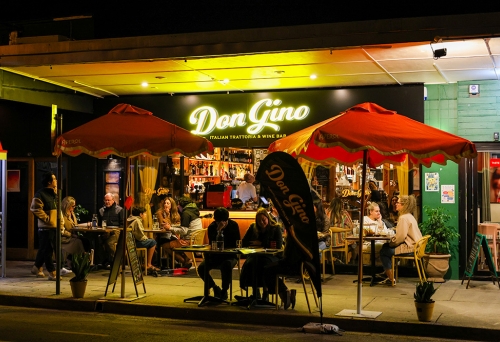 Tables on street at Don Gino West End