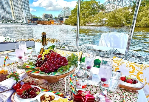 Table of picnic food on boat Brisbane
