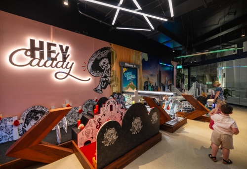 Interior of X-Golf South Bank showing children playing a game