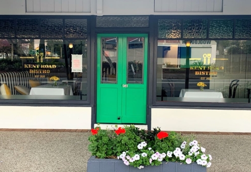 Green front door entrance to Kent Road Bistro, Wooloowin