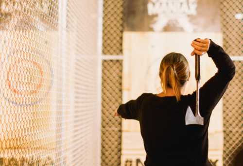 Woman throwing an axe at MANIAX, Newstead 