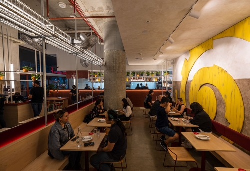 People dining inside Mamak Malaysian Roti & Satay Brisbane CBD