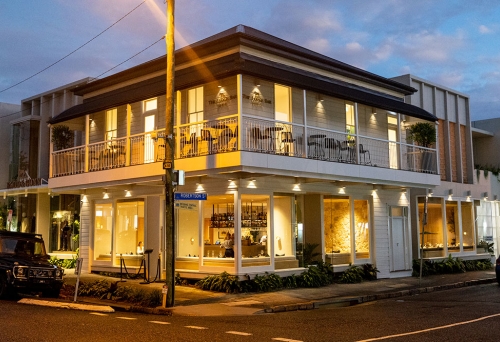 Lit-up exterior of Rodd & Gunn's The Lodge Fortitude Valley