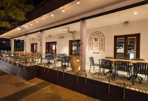 Lit up exterior verandah at The Royal Hotel Nundah