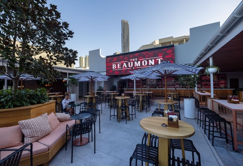 Outdoor seating and tree at The Beaumont