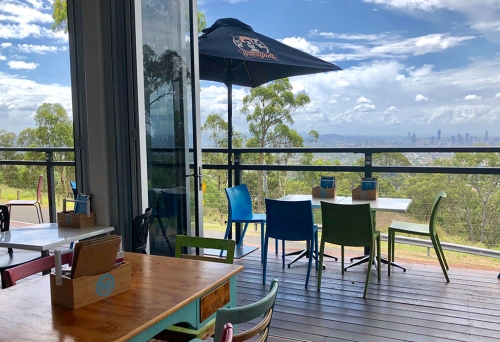 Deck of The LoveWell Project Cafe Mt Gravatt Lookout overlooking Brisbane