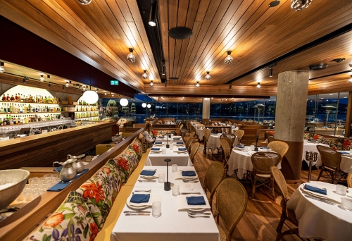 Line-up of tables and bar inside Tillerman Brisbane CBD