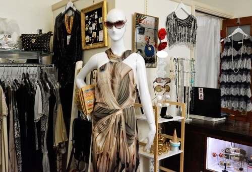 Mannequin wearing sunglasses and dress inside Vintage Collective Annerley