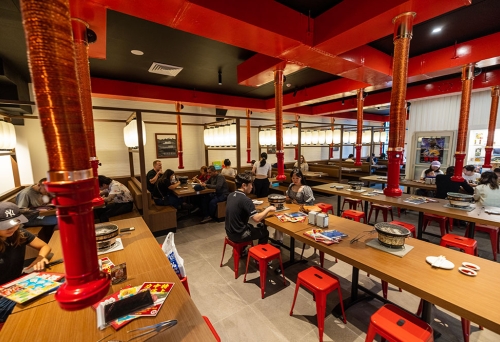 People seated at tables inside Yakiniku Hachi Brisbane CBD