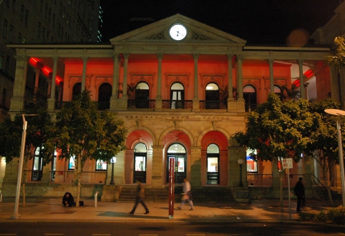 GPO building lit up at night in Brisbane.