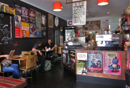 Counter and seating inside hHallowed Grounds Café