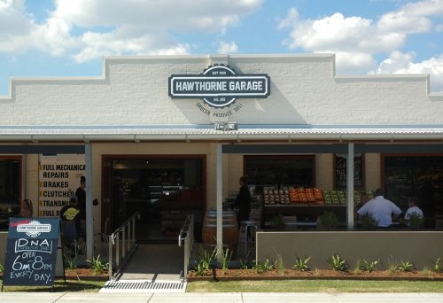 Hawthorne Garage shop front with patrons sitting having a coffee and lunch.