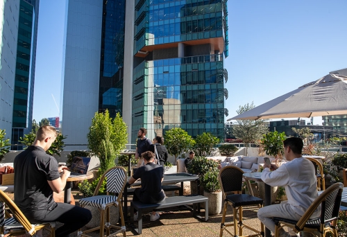 People seated at Raise Rooftop Brisbane CBD