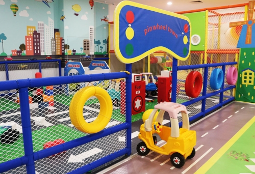 Play equipment inside Pinwheels Cafe