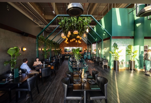 Soko Rooftop interior with patrons sitting at tables