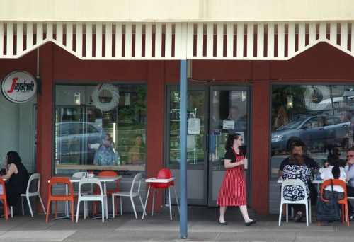 Waitresses serving patrons on footpath outside In A Pickle Cafe in Camp Hill
