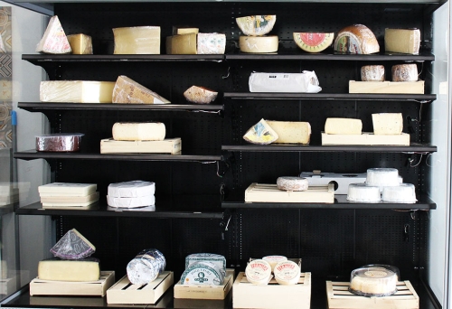 Shelves of cheese Le Fromage Yard Morningside