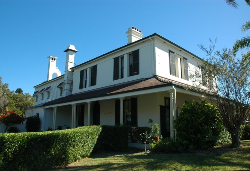 Lota House building and front garden in lota.