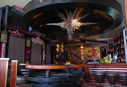Lychee Lounge bar interior including chandelier and seating