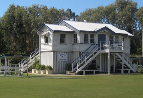 Weatherboard club cottage and croquet green