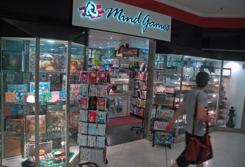 Person walking in front of Mind Games in the Myer Centre Queen St Brisbane