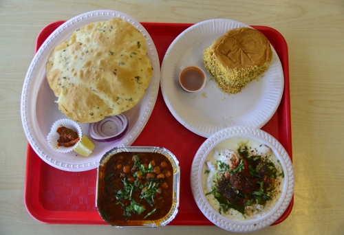 Food on plates at Mirchh Masala Woolloongabba