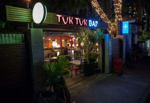 Exterior of Tuk Tuk Bar Milton at night