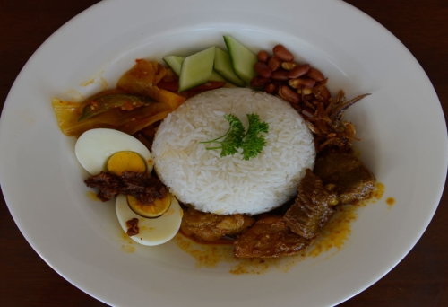 Plate of Malasian food inside Satay Ria restaurant in Cannon Hill